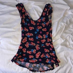 navy blue tank top with flowers with an open back